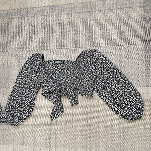 Long sleeve animal print tie front crop top.
